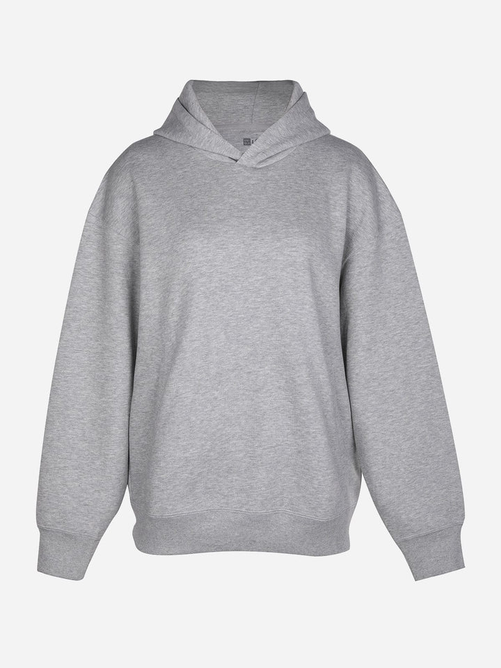 A model wearing a OTHERS Oversized Hooded Pullover Fleece Hoodie S